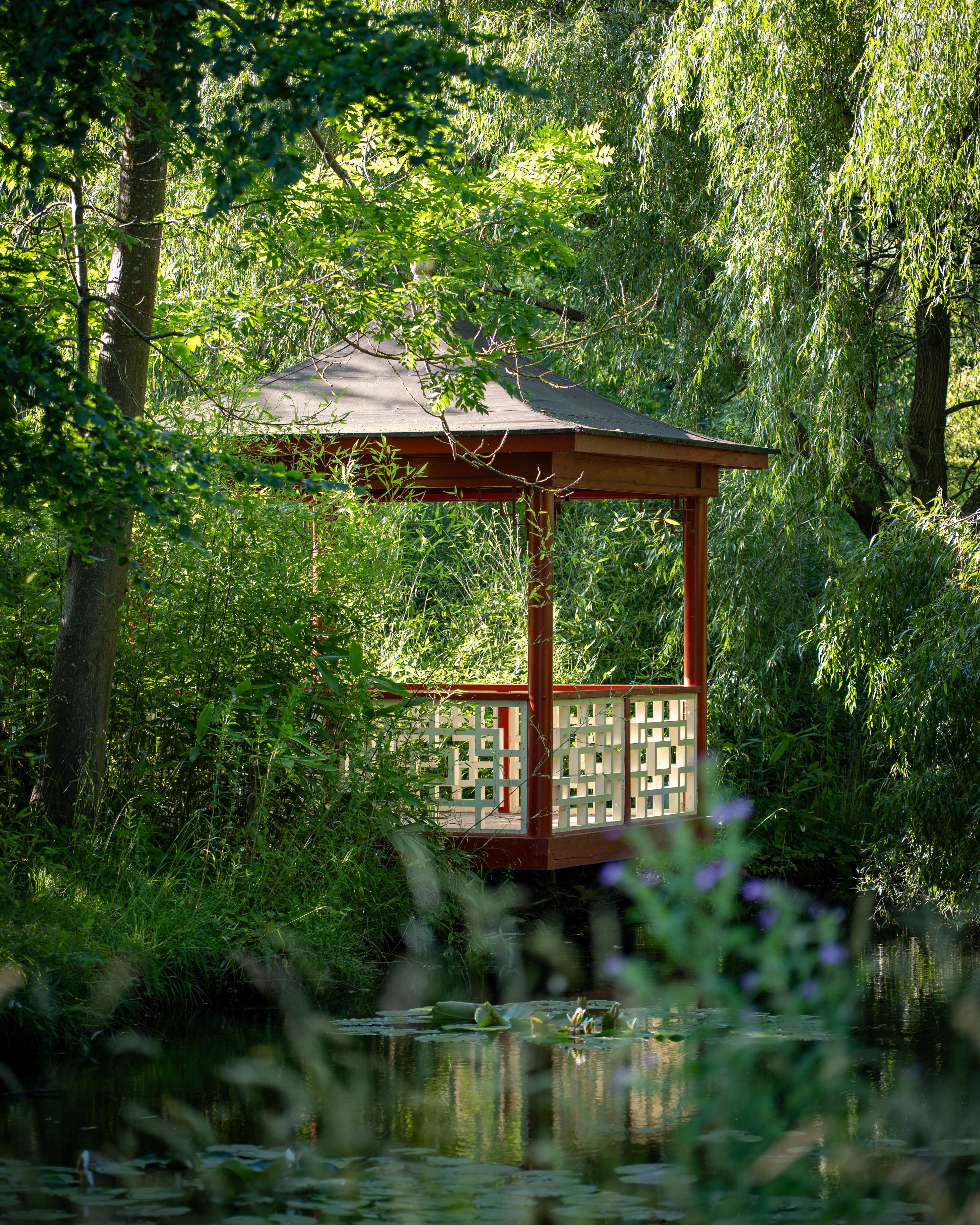 Serene Gazebo in Lush Swedish Park Landscape · Free Stock Photo