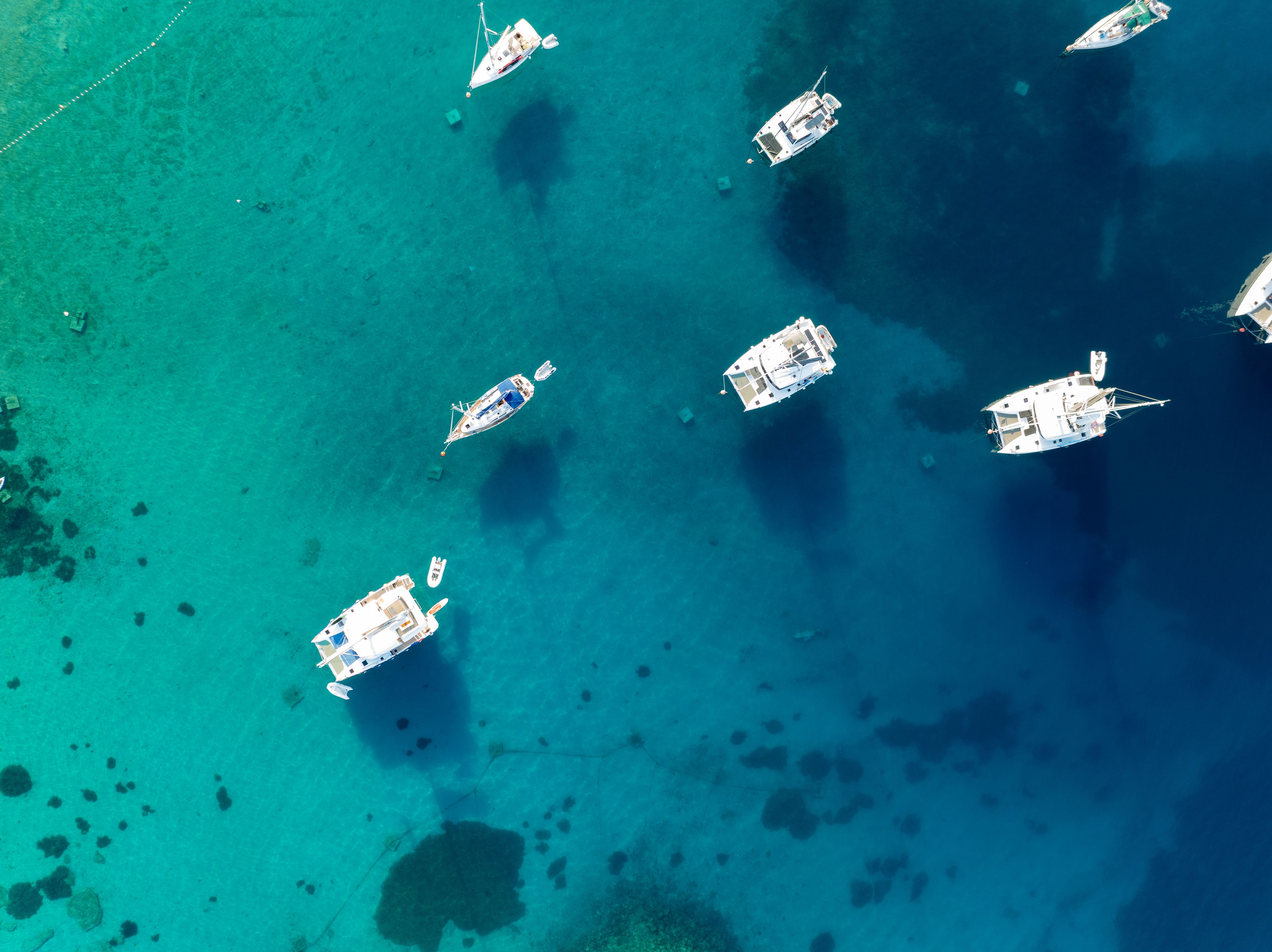 Aerial View of Boats in Clear Blue Sea at Primošten · Free Stock Photo