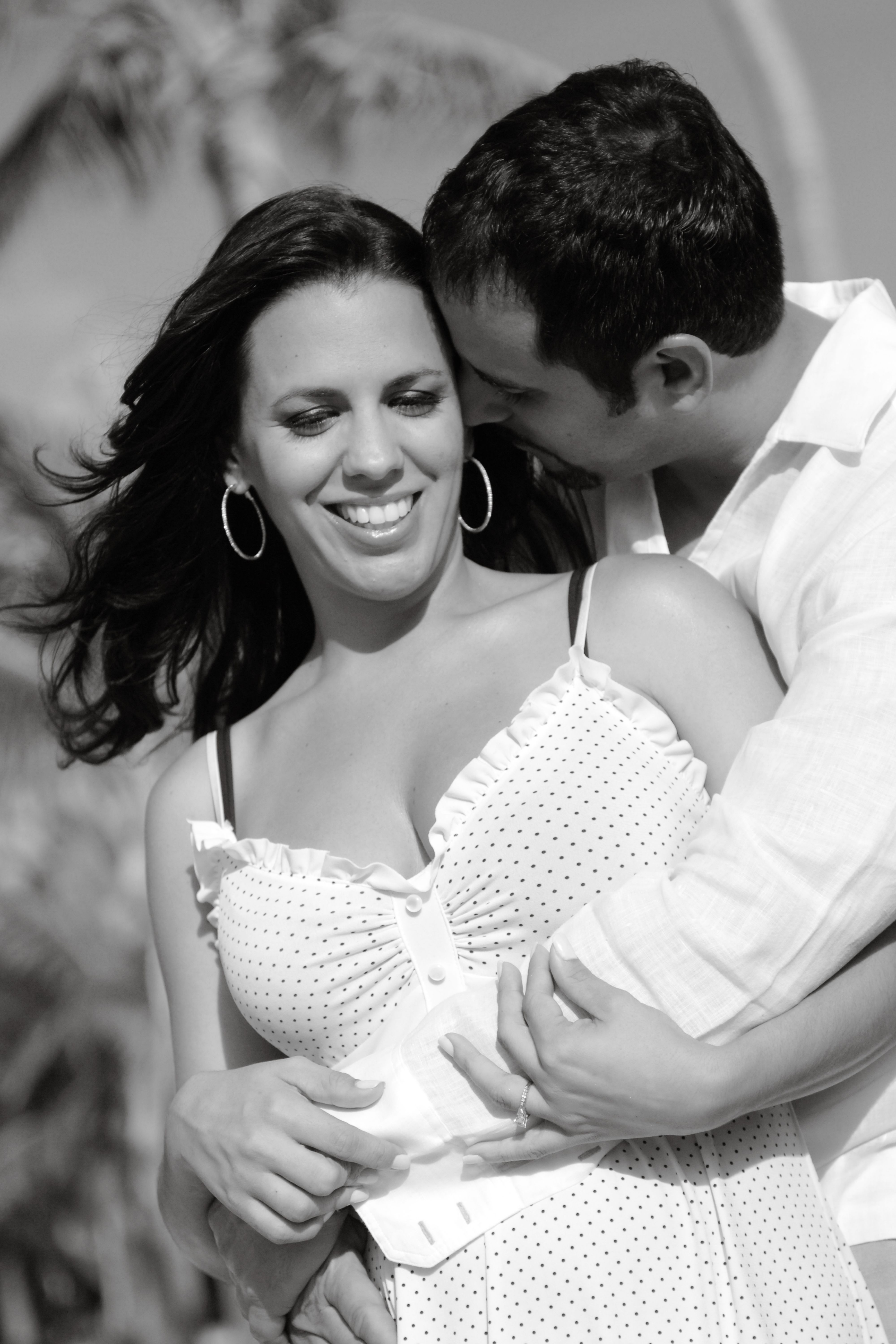 romantic couple embracing on miami beach
