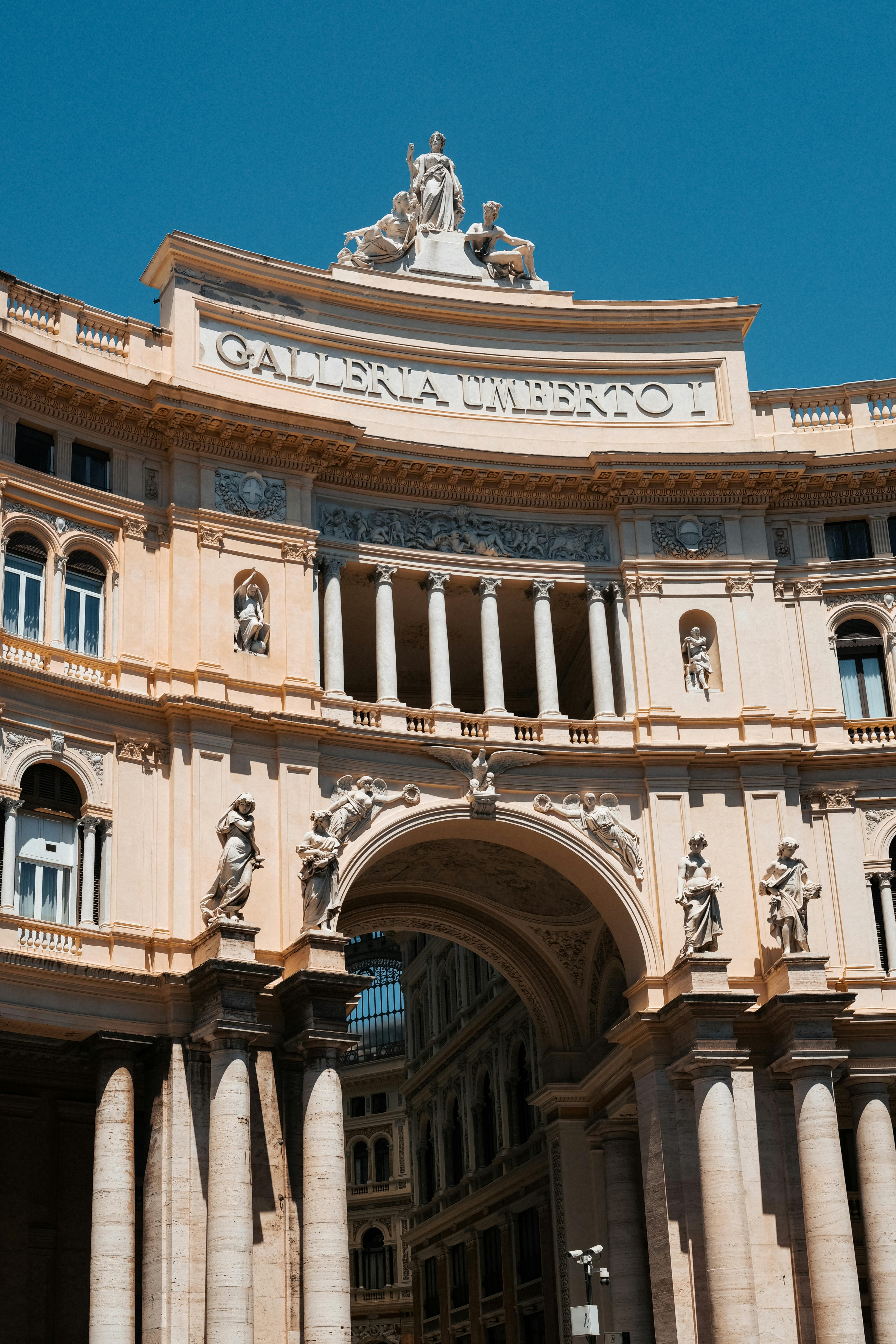 Majestic view of Galleria Umberto I's architectural grandeur in Naples, Italy.