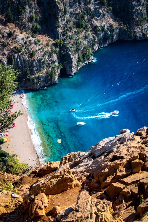 Free A breathtaking aerial view of the scenic Butterfly Valley in Muğla, Türkiye with turquoise waters and lush cliffs. Stock Photo