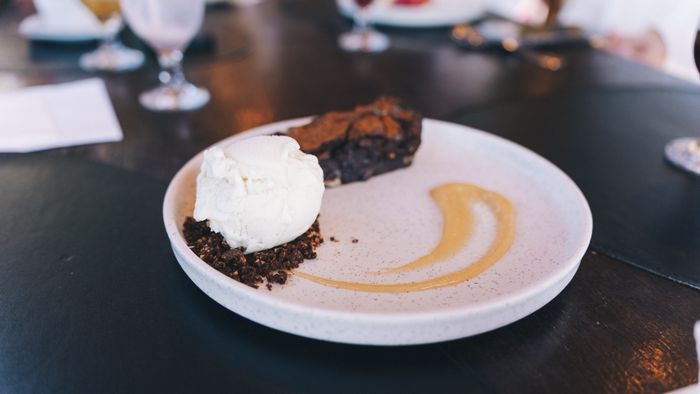 Gourmet dessert plate with ice cream and brownie