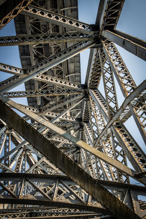 Free Detailed view of the steel beams forming the bridge in Porto, Portugal, showcasing its architectural beauty. Stock Photo