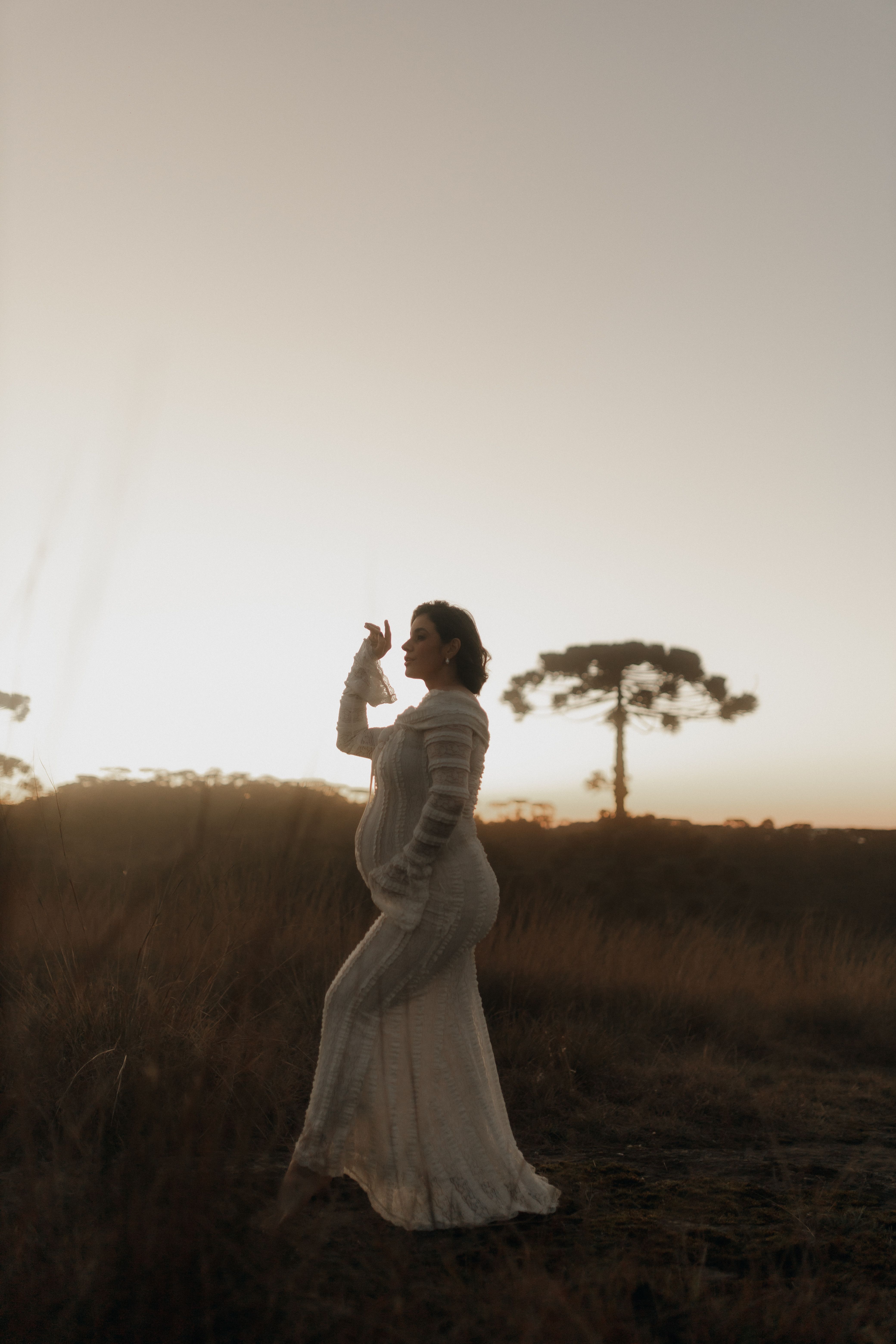 Woman in White Dress Standing Beside Brown Tree · Free Stock Photo