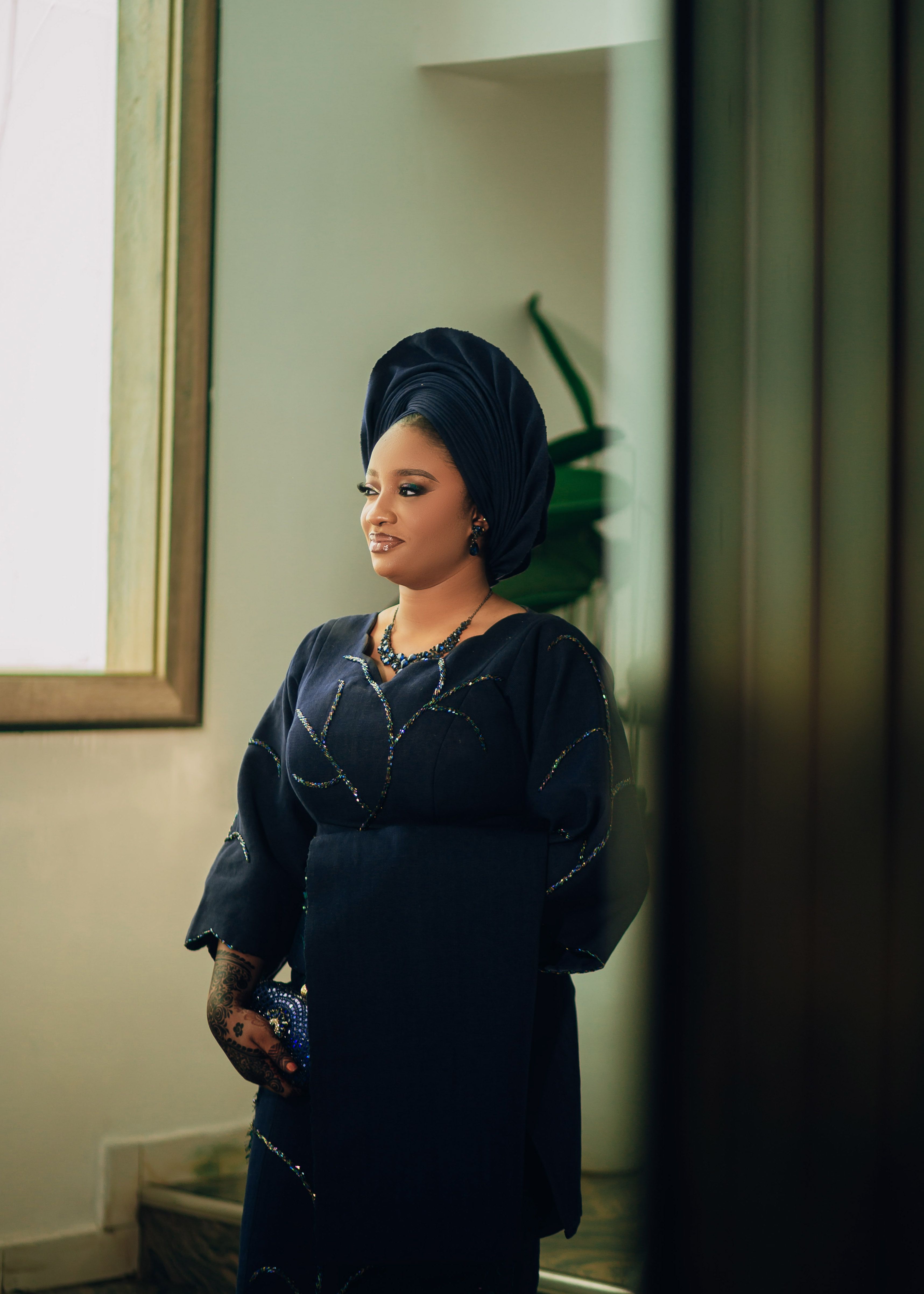 Elegant Woman in African Traditional Attire Indoors · Free Stock Photo