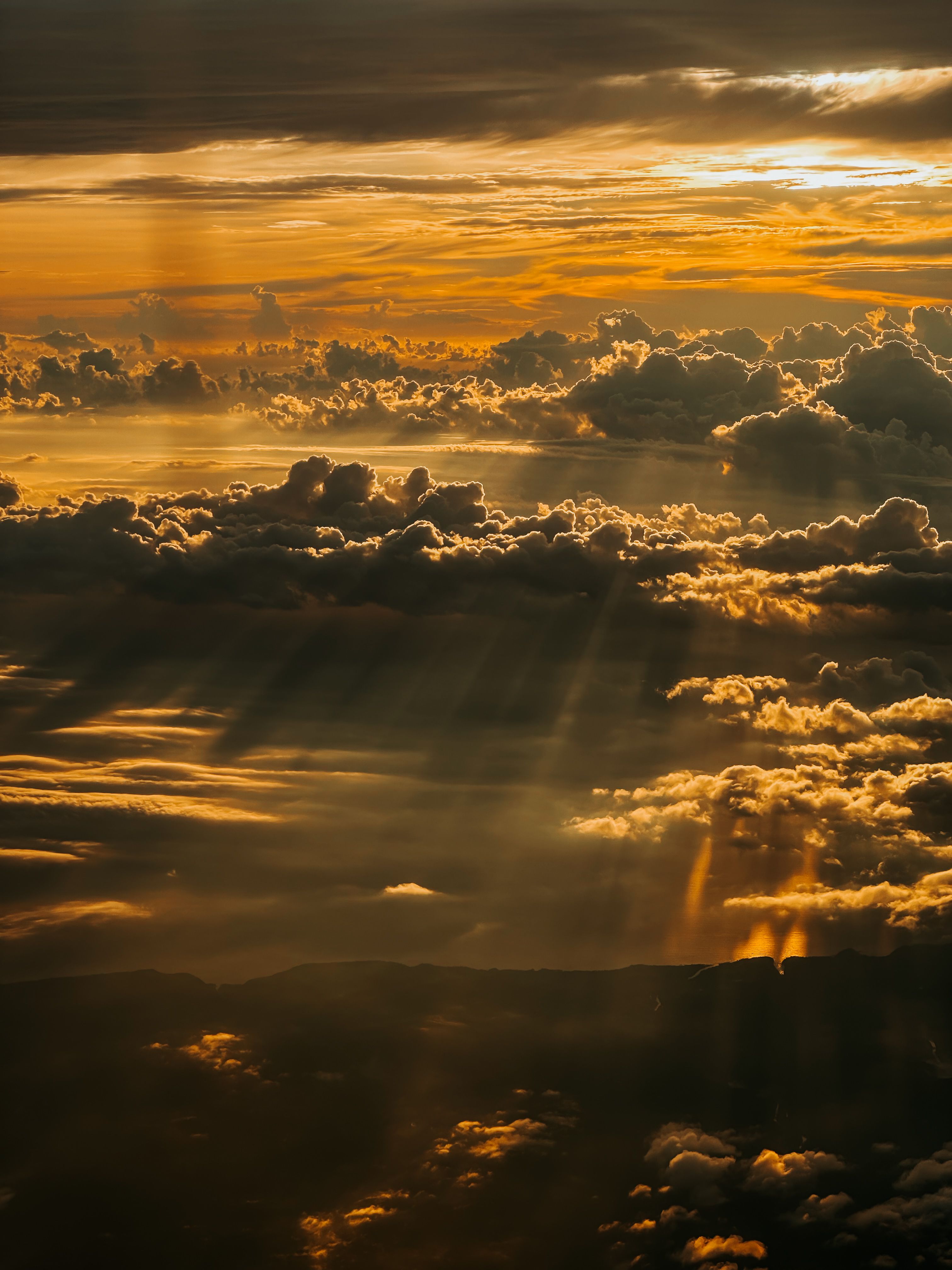 Dramatic Golden Sunrise Above the Clouds · Free Stock Photo