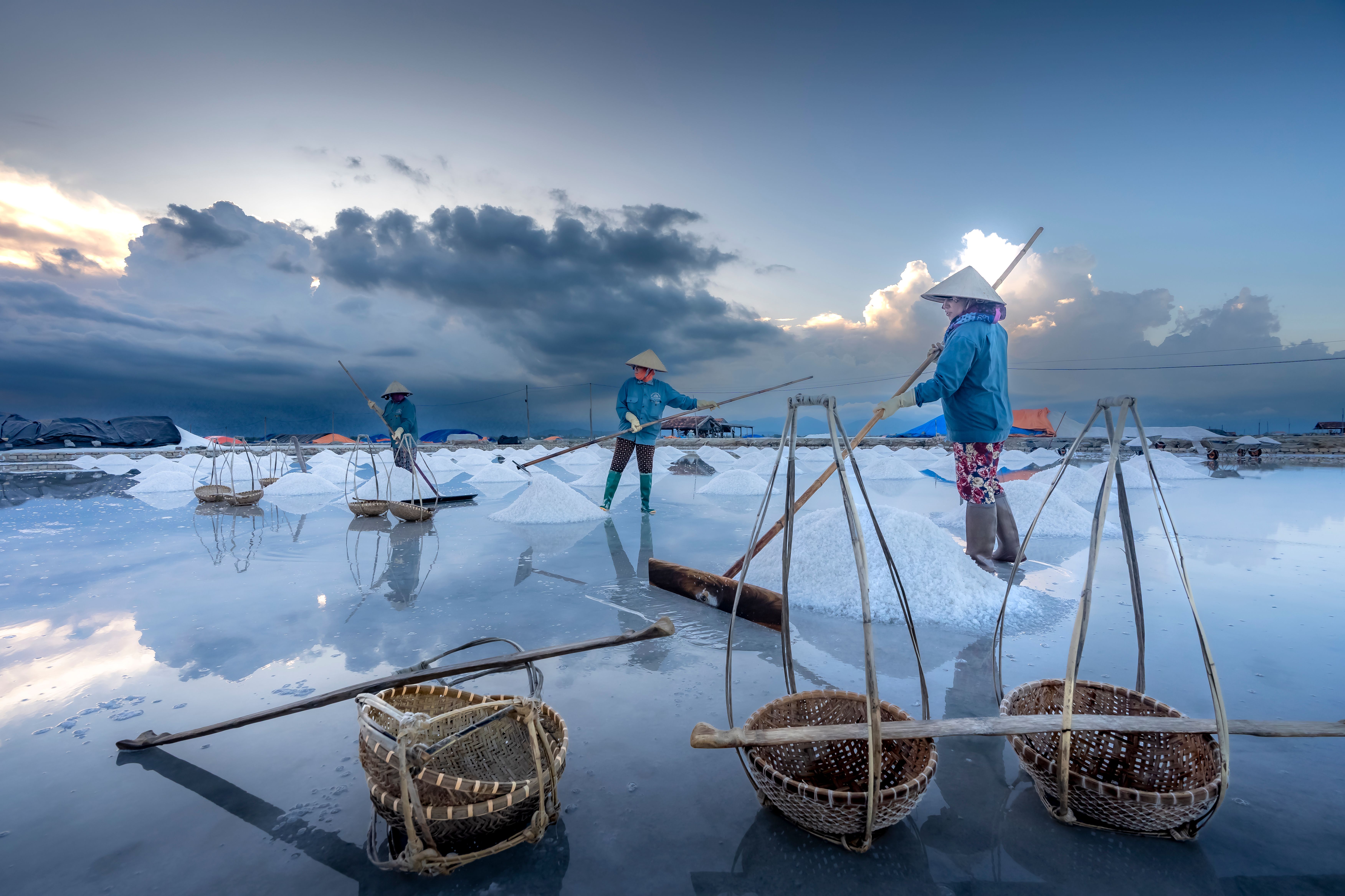 Traditional Salt Farmers at Work During Sunrise · Free Stock Photo