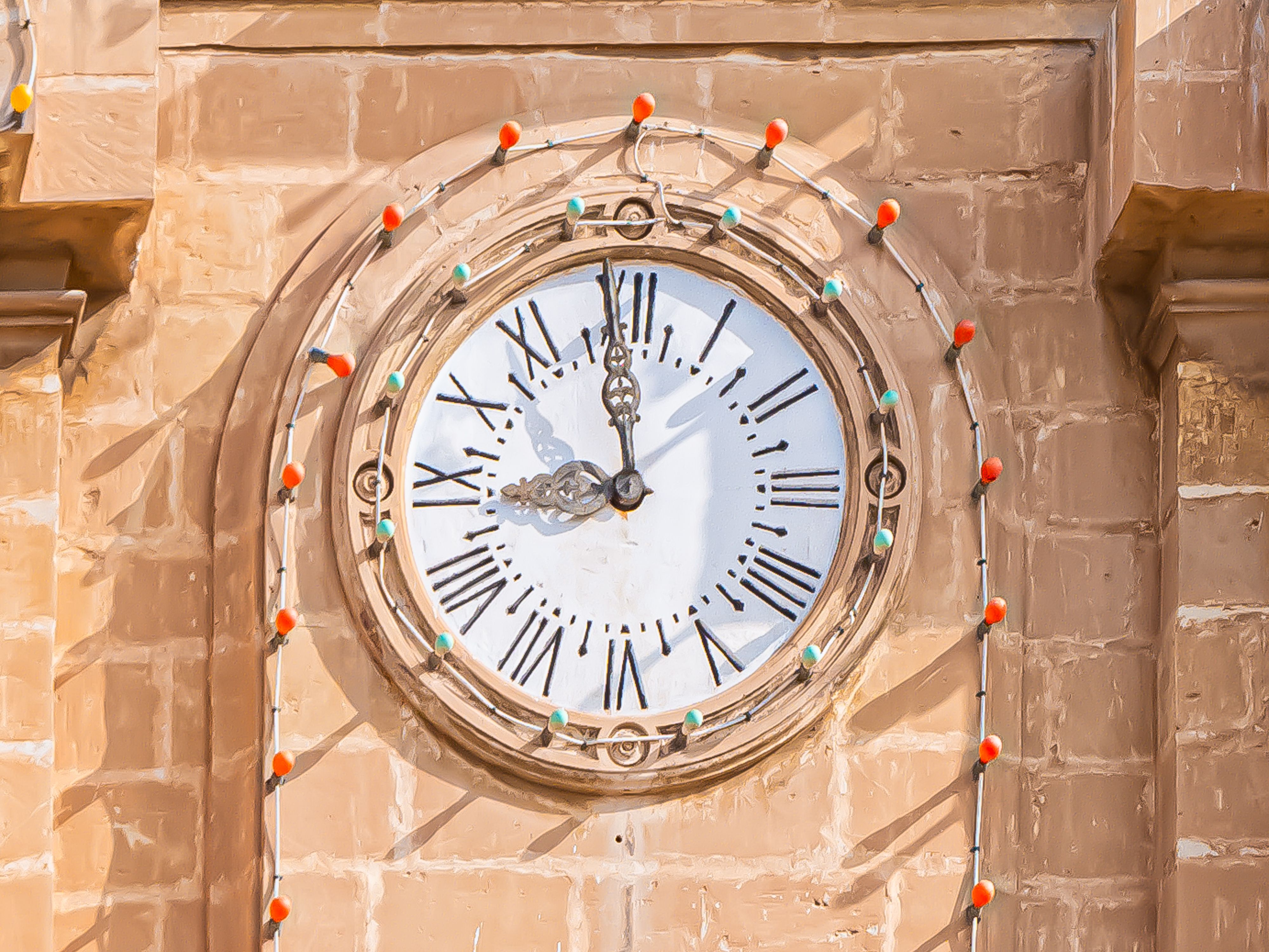 Historic Clock Tower Facade with Roman Numerals · Free Stock Photo