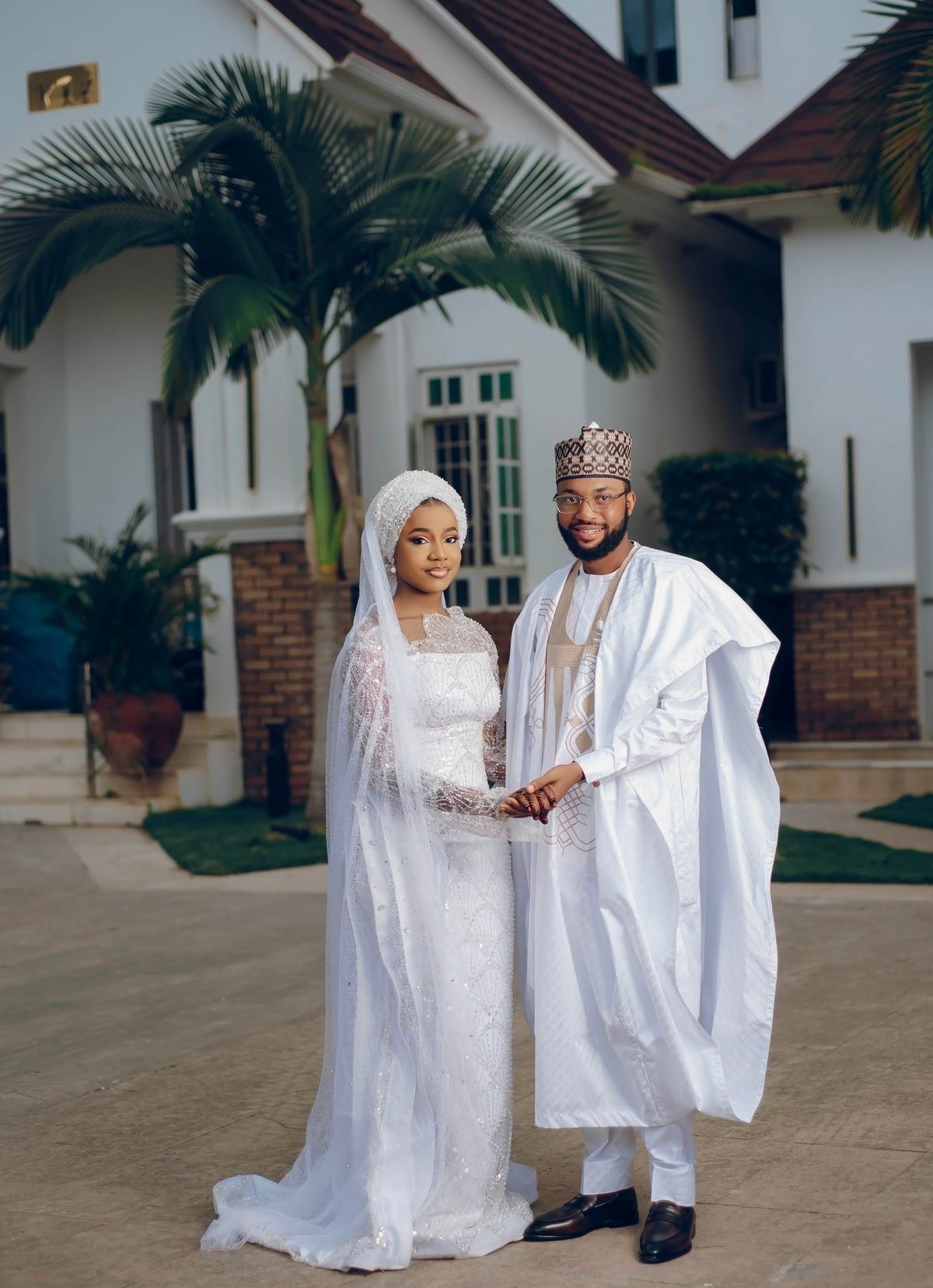 Elegant African wedding couple in traditional attire, representing marriage versus everyday commitment