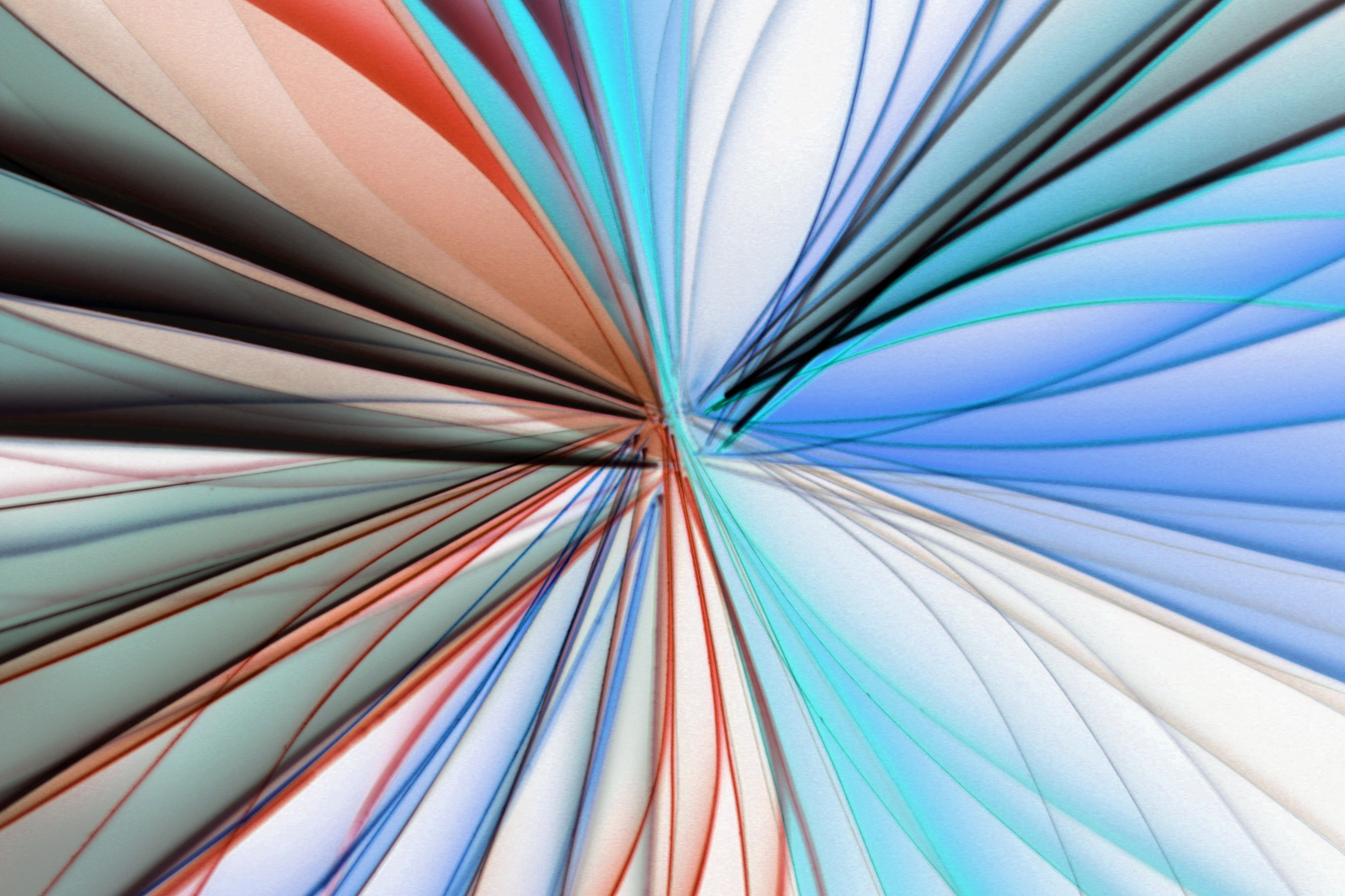 Vibrant abstract art featuring dynamic lines and colorful light patterns.