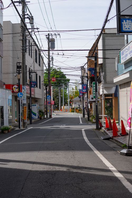 Free Deserted urban street in Japan with power lines and buildings. Stock Photo