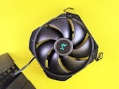 Black Computer Fan on Yellow Background