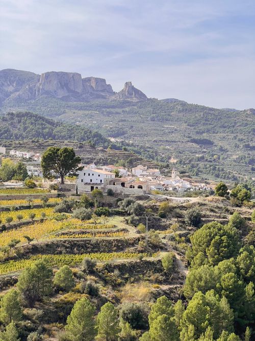Free A picturesque view of Guadalest with terraced fields and mountains in Land Valencia, Spain. Stock Photo