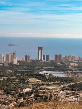 Aerial view of Benidorm's skyline against the Mediterranean Sea.