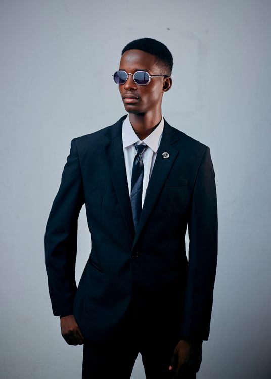 Stylish Young Man in Formal Wear with Sunglasses · Free Stock Photo