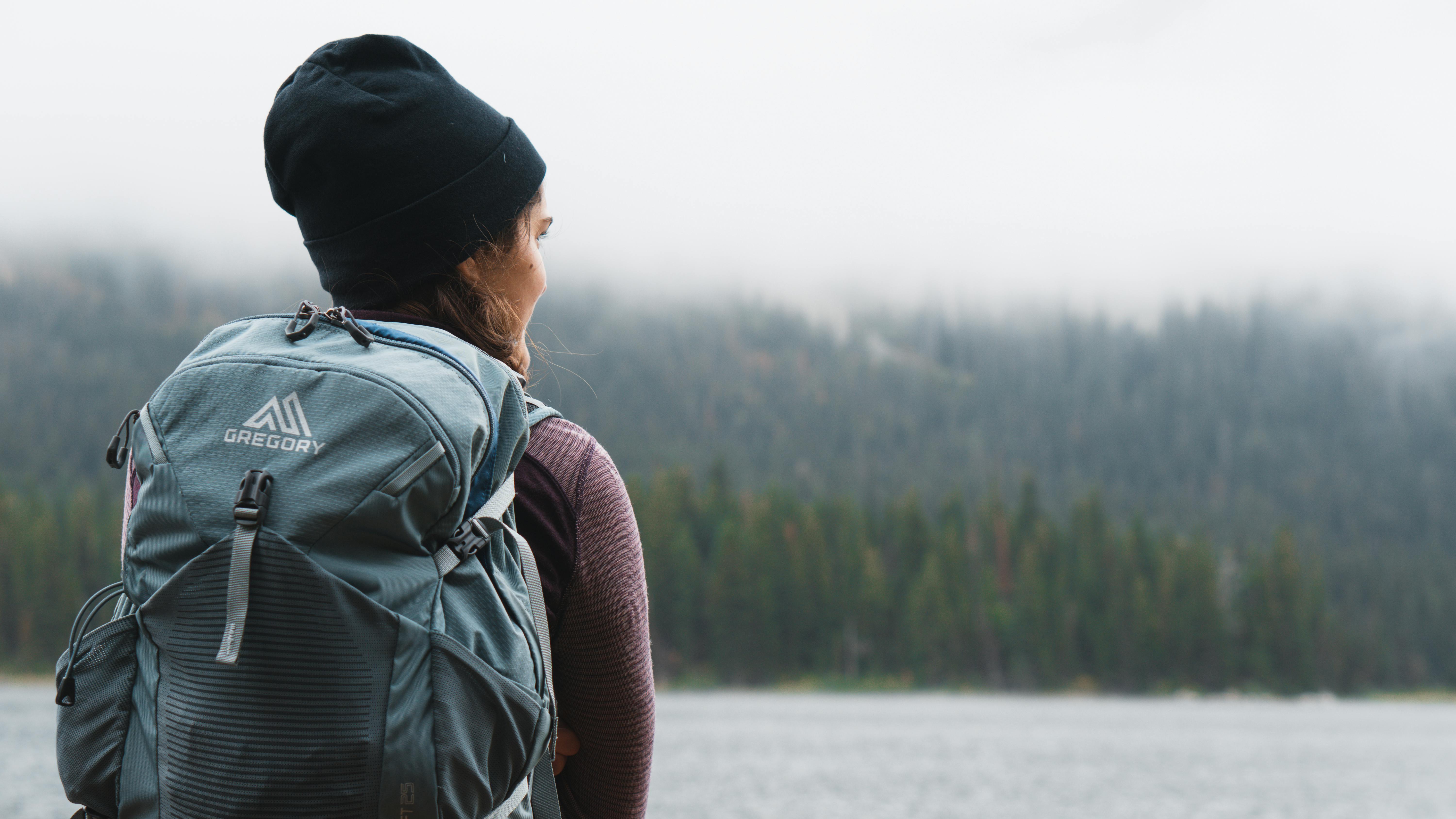 Close-up Photography of Woman Carrying Gray Backpack \u00b7 Free Stock Photo