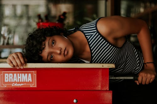 Photo Of Woman Wearing Striped Tank Top