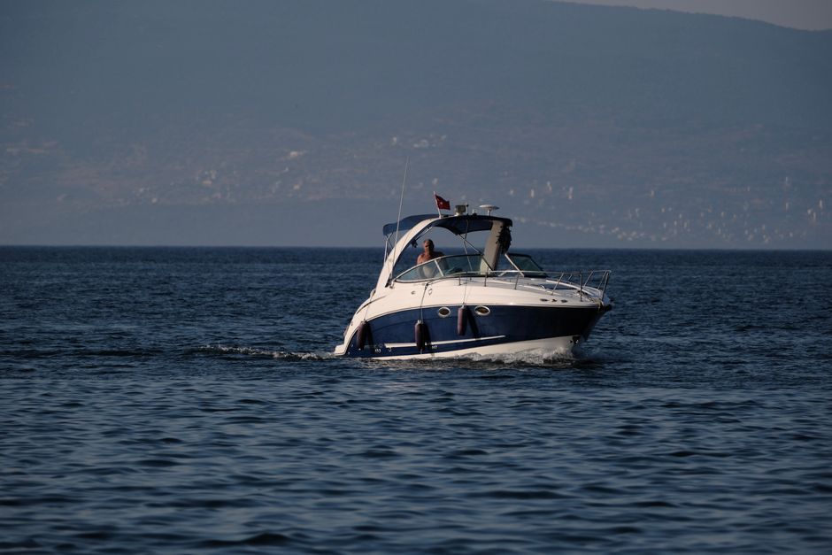 Ultimate Full-day Boat Tour from Antalya with Lunch and Foam Party Review: The Ultimate Turkish Riviera Adventure Review 2026 - A beautiful yacht cruising near the coast of Foça, İzmir, Turkey during the day.