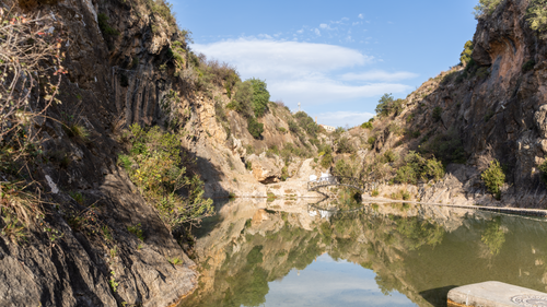 Free Explore the tranquil beauty of a natural pool nestled in Bolbaite, Spain. Stock Photo