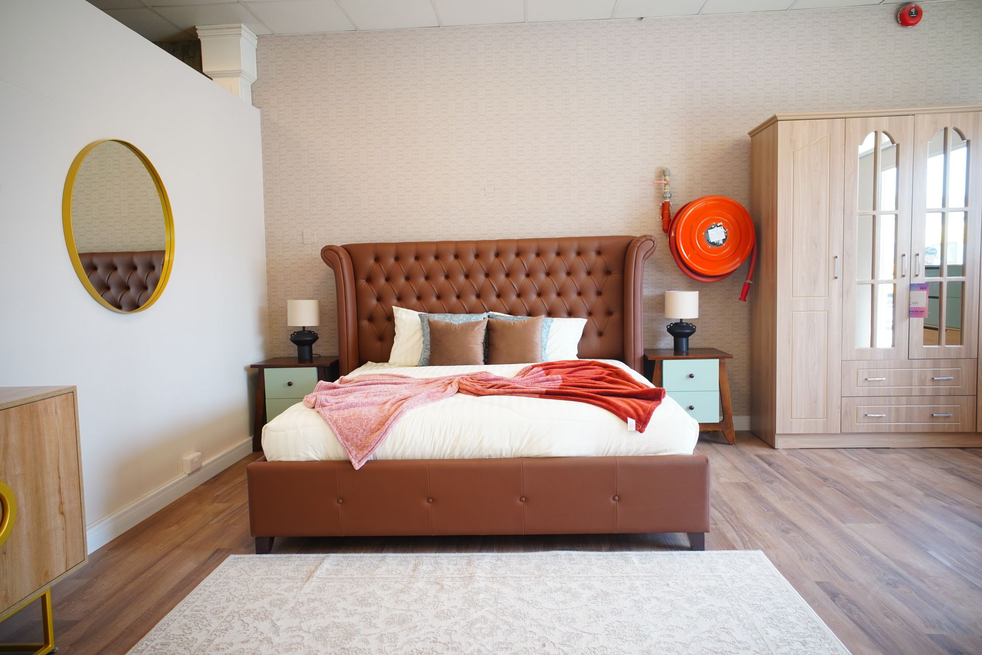 Explore a stylish modern bedroom featuring luxury furniture and warm tones.