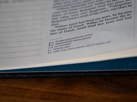 A close-up view of an open Bible displaying text, focused on Bible study and scripture reading.