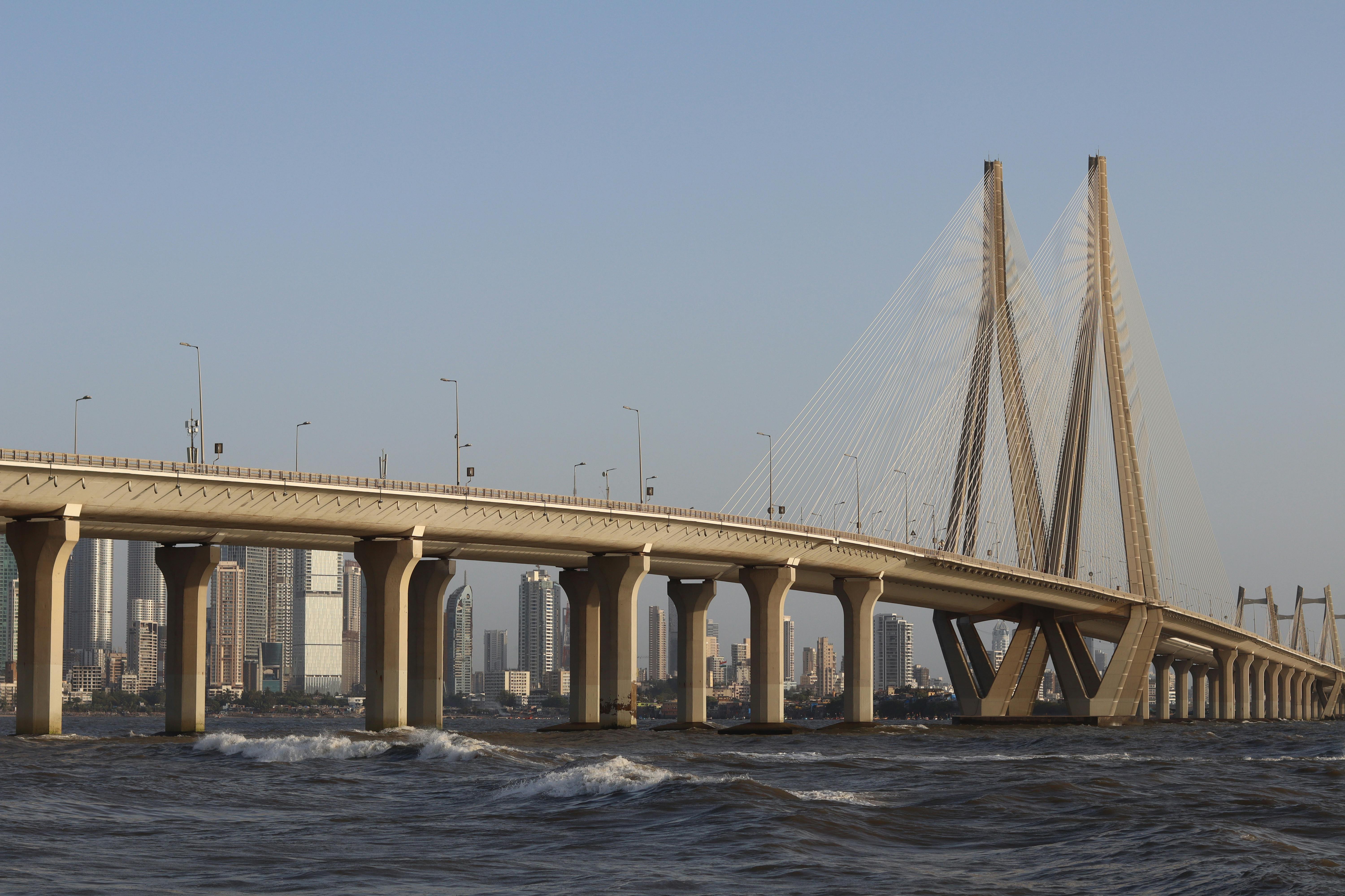 View of the iconic Bandra-Worli Sea Link in Mumbai, showcasing modern architecture against a city skyline.
