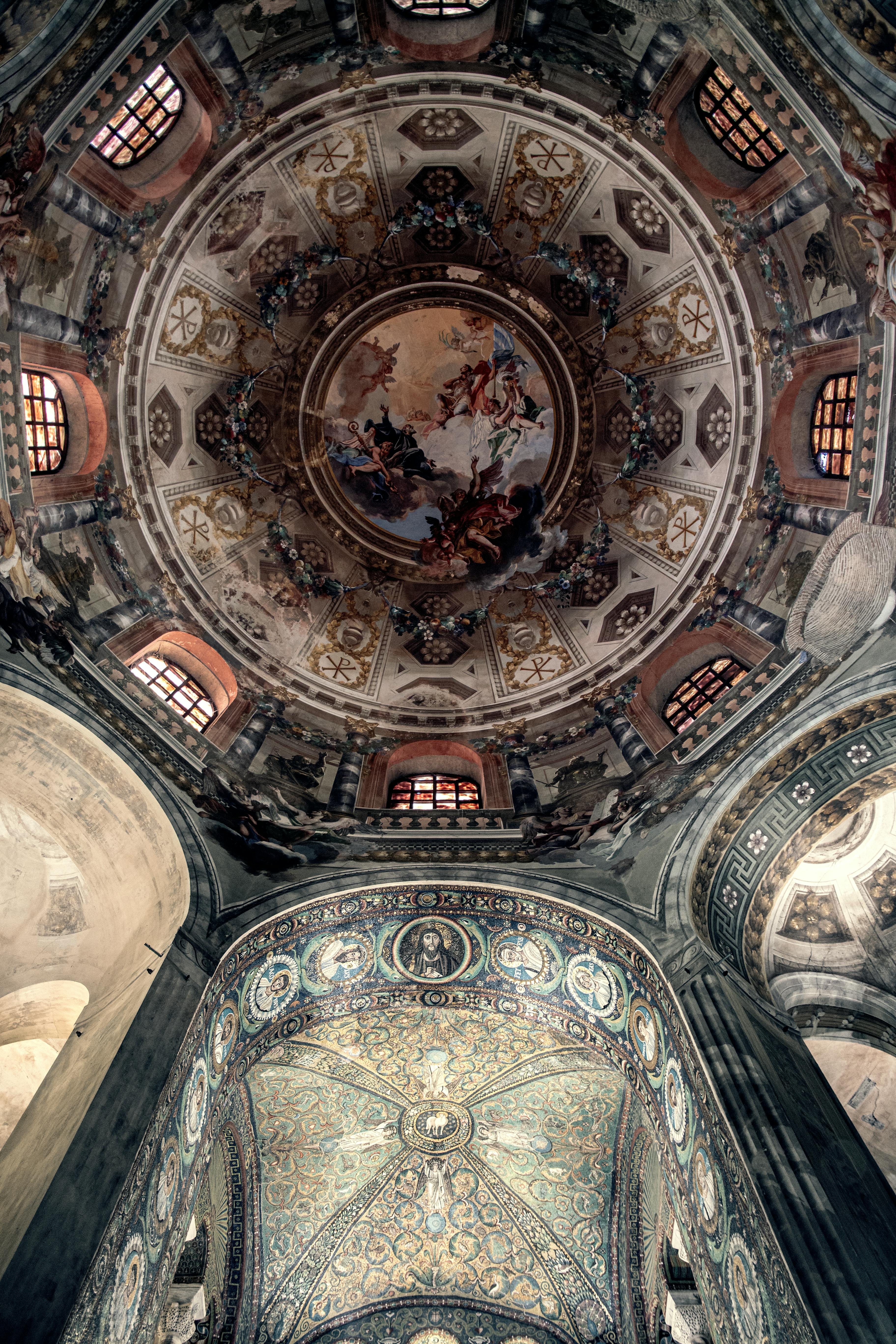 Intricate Byzantine mosaics and dome interior of Basilica San Vitale, Ravenna, Italy.