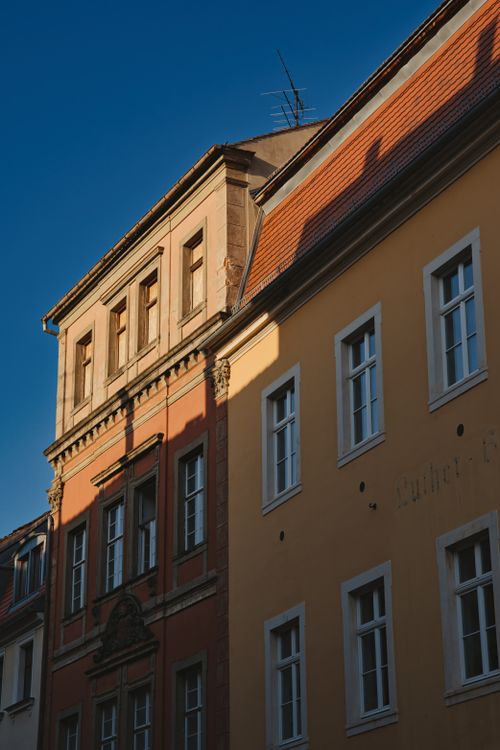 Free Vintage building facade under clear blue sky in Zittau, Germany, capturing architectural beauty. Stock Photo