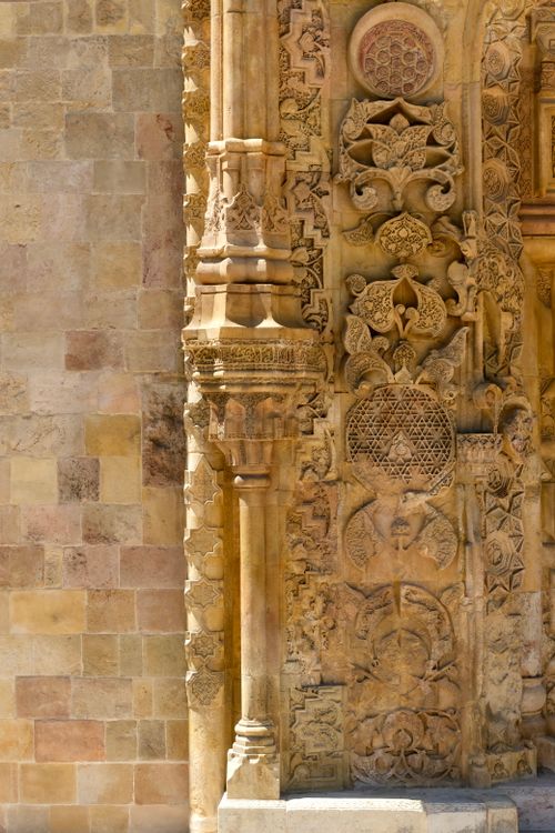 Free Detailed stone carvings on historic architecture, showcasing intricate patterns and cultural craftsmanship. Stock Photo
