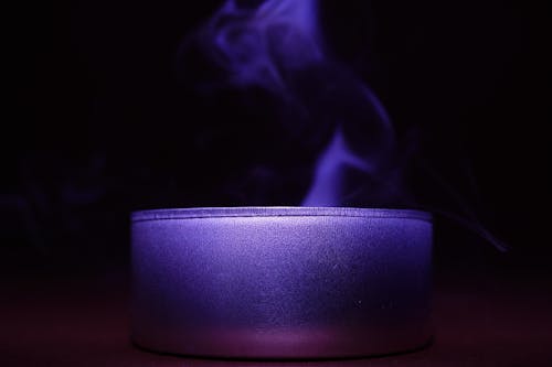 Free Close-up of Blue Candle Against Black Background Stock Photo