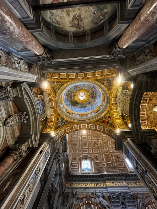 Free Stunning view of St. Peter's Basilica ceiling showcasing Renaissance art and architecture in Vatican City. Stock Photo