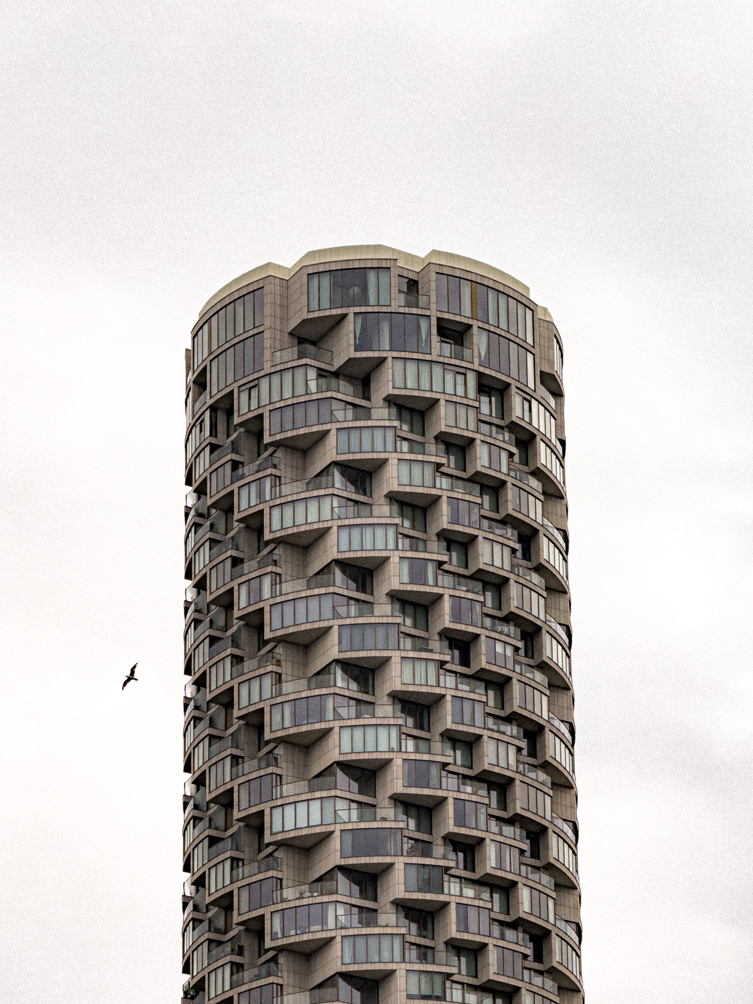 Modern High-Rise with Unique Architecture · Free Stock Photo