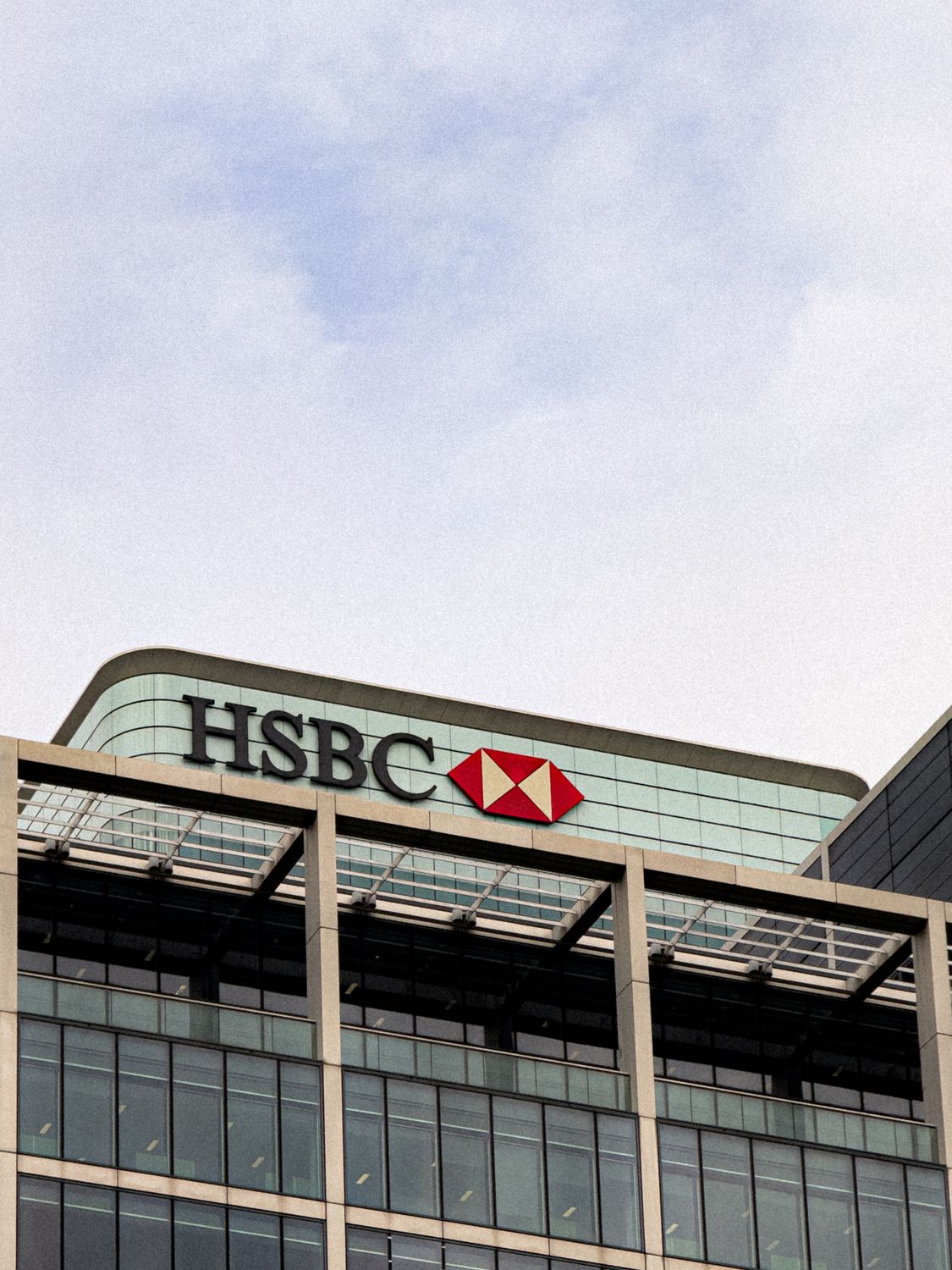 Modern HSBC Building Against Blue Sky Free Stock Photo modern-hsbc-building-against-blue-sky-free-stock-photo
