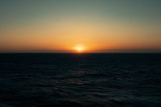 A breathtaking sunset over the ocean with vivid colors and a peaceful horizon.