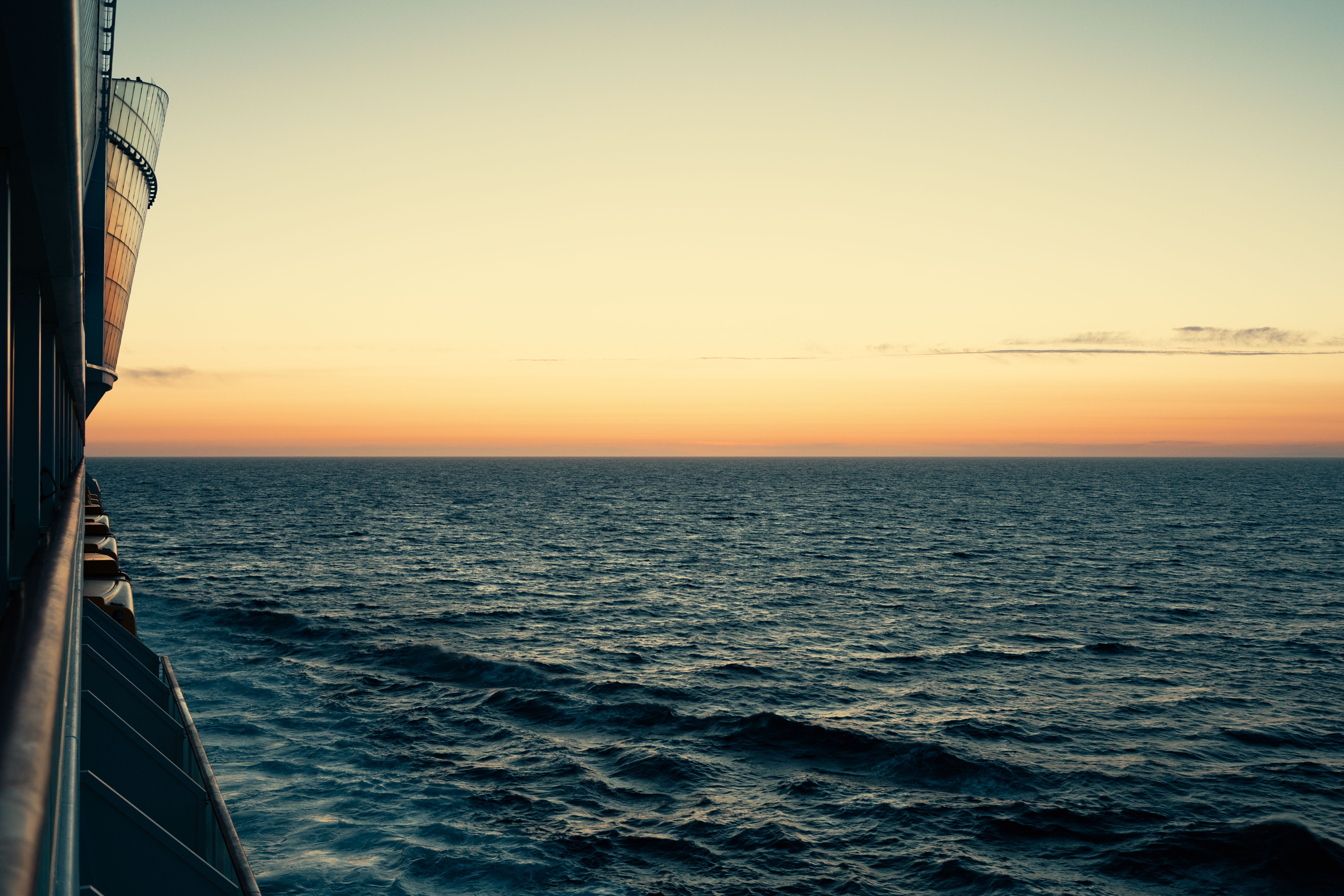 Serene Ocean View from a Cruise Ship at Sunset · Free Stock Photo