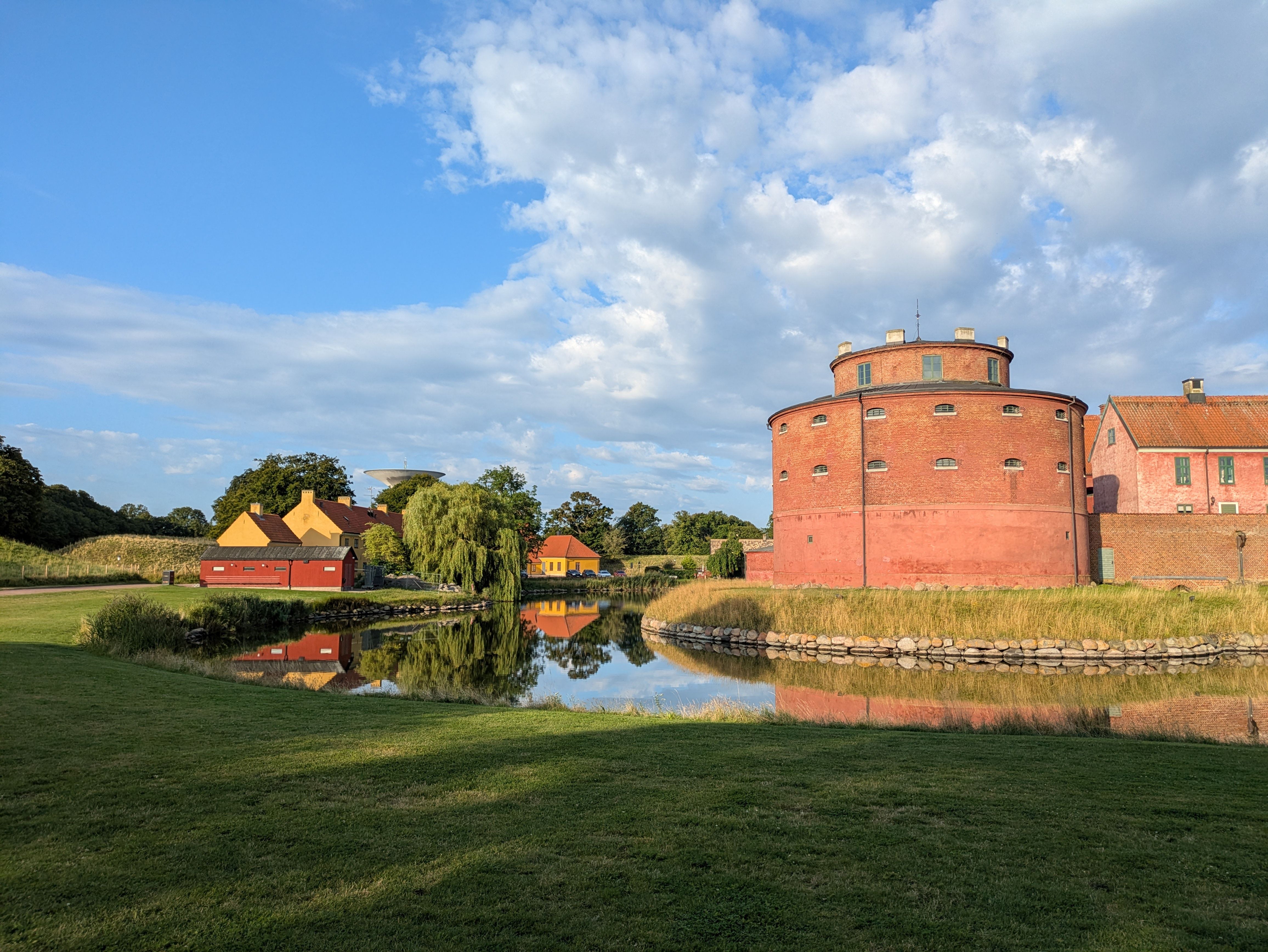 Kuressaare episcopal castle reflected in its moat on Saaremaa