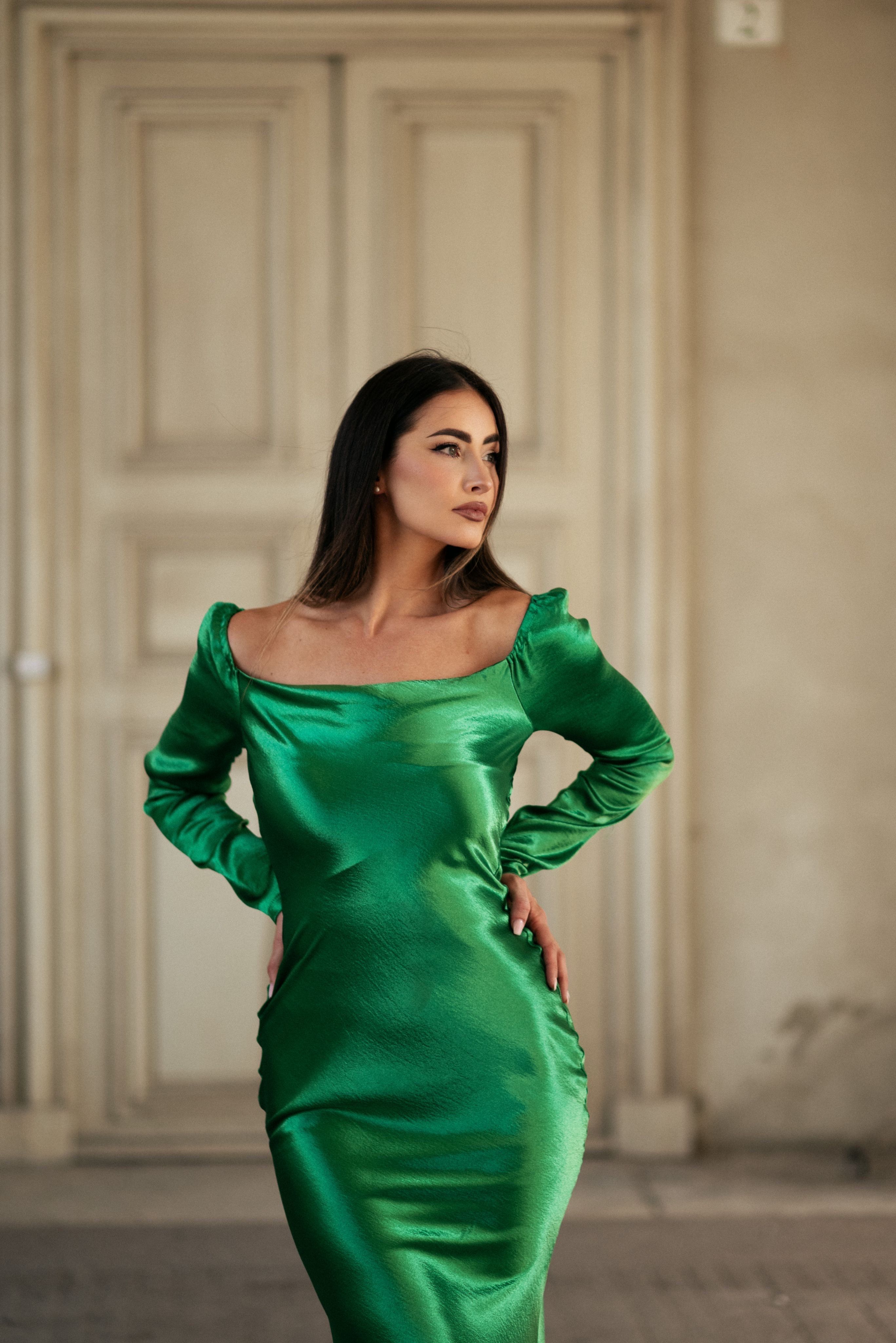 Elegant Woman in Green Dress Standing Outdoors · Free Stock Photo
