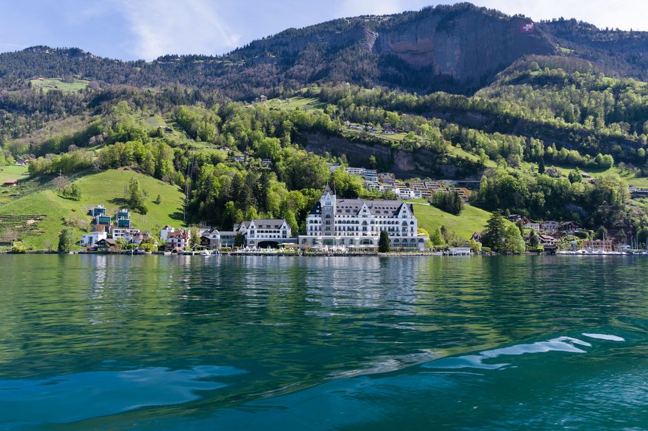 Stunning view of Vitznau, Switzerland, with the Alps and Lake Lucerne in the backdrop.