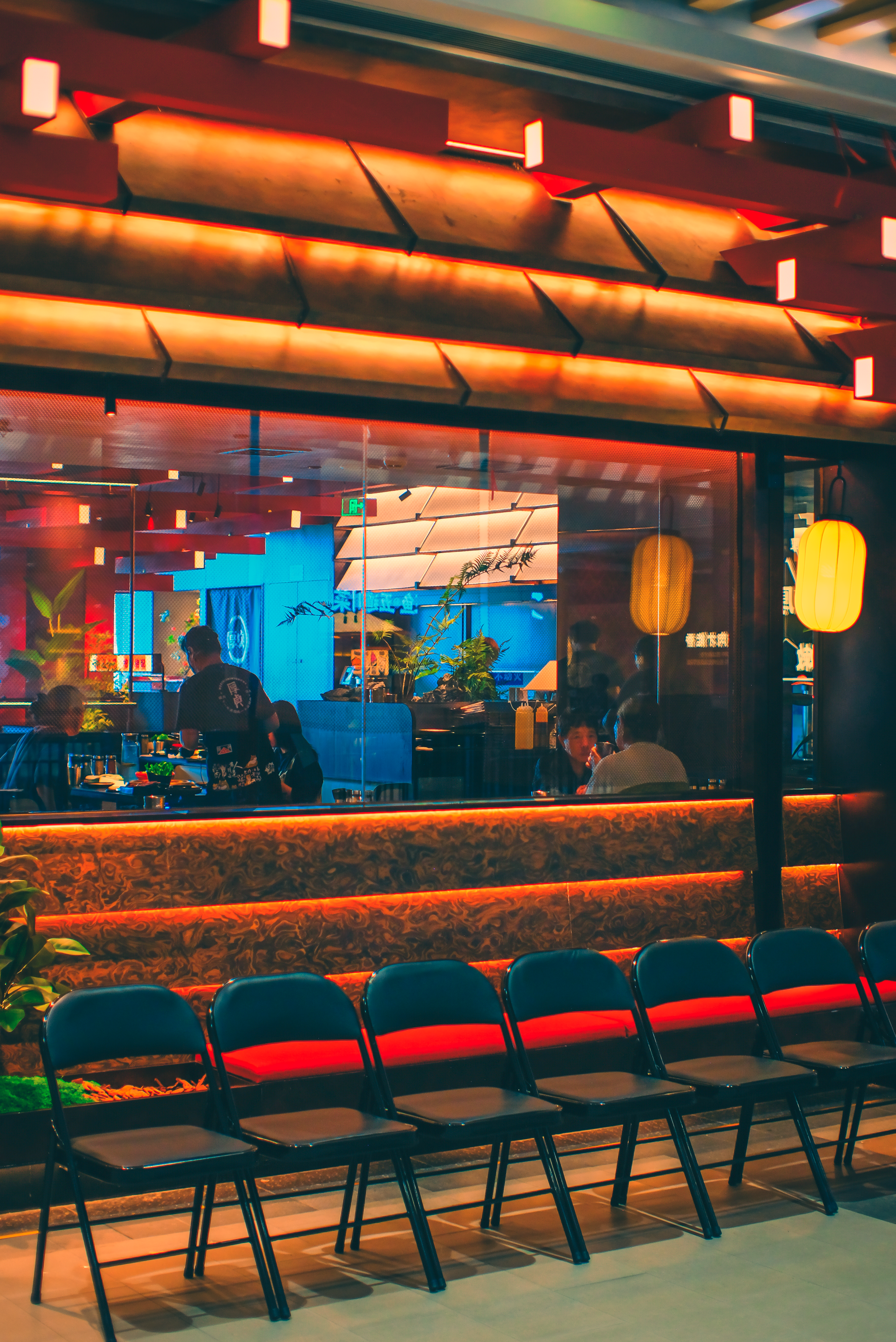 Vibrant Asian Restaurant Interior with Chairs · Free Stock Photo