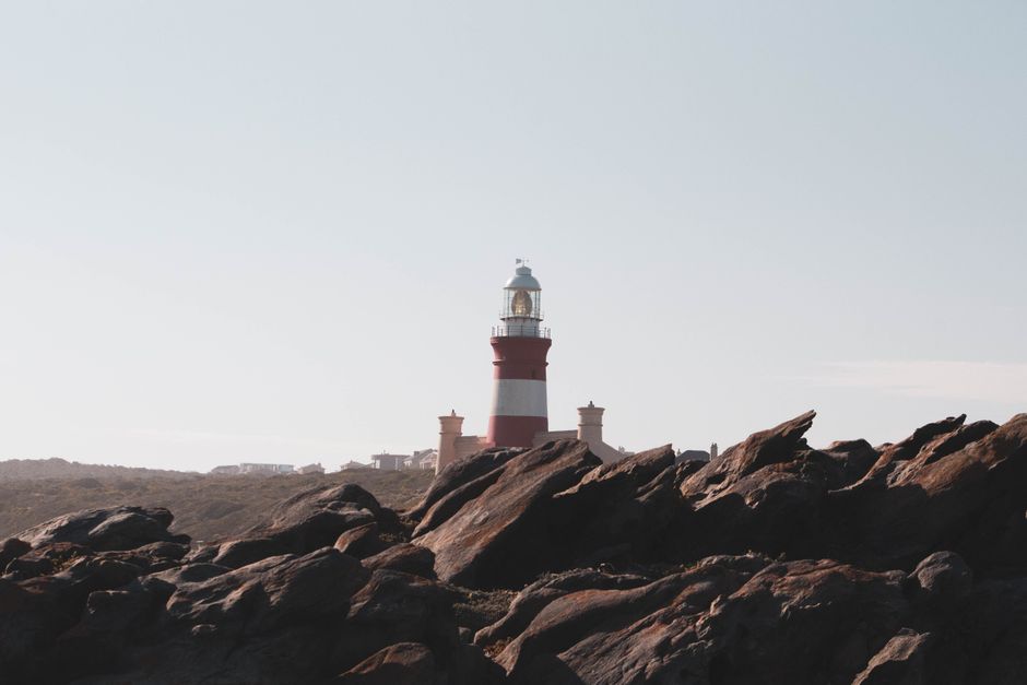 lighthouse rocky coast signal