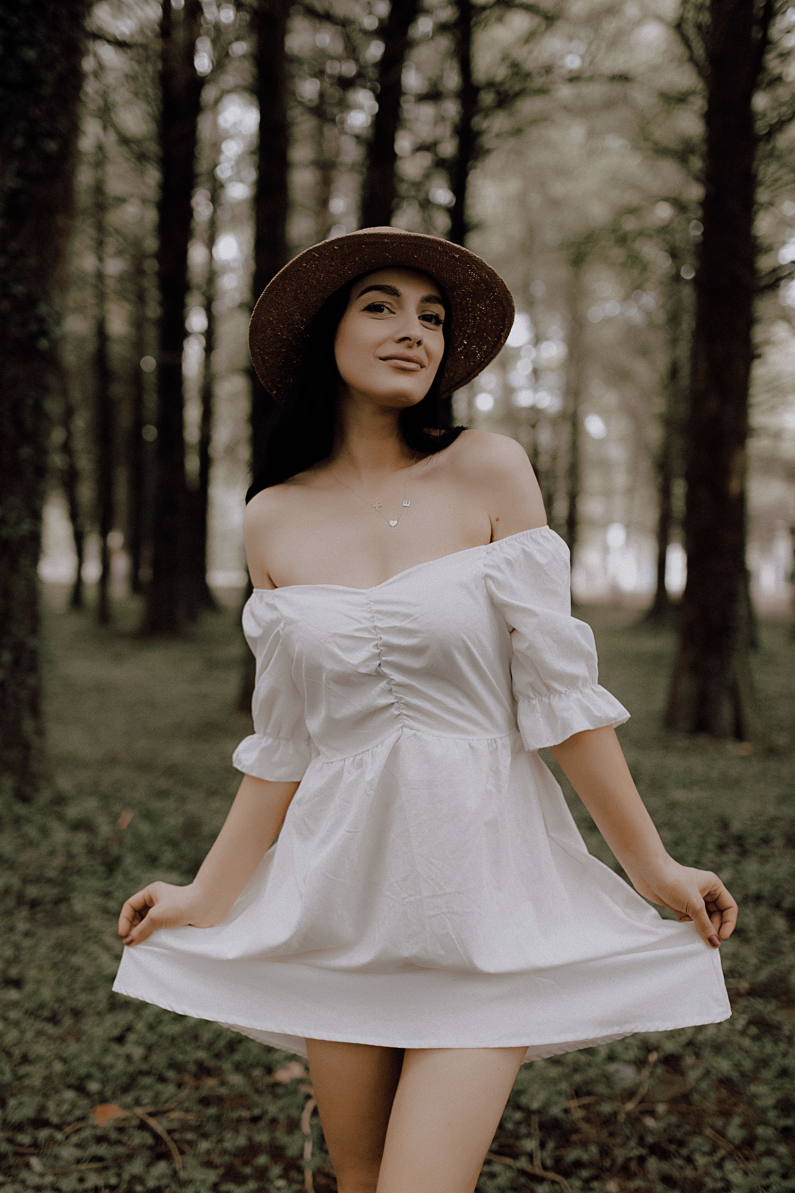 Elegant Woman in White Dress in Forest · Free Stock Photo