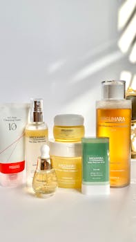 Chic arrangement of skincare essentials in soft lighting, showcasing elegance.