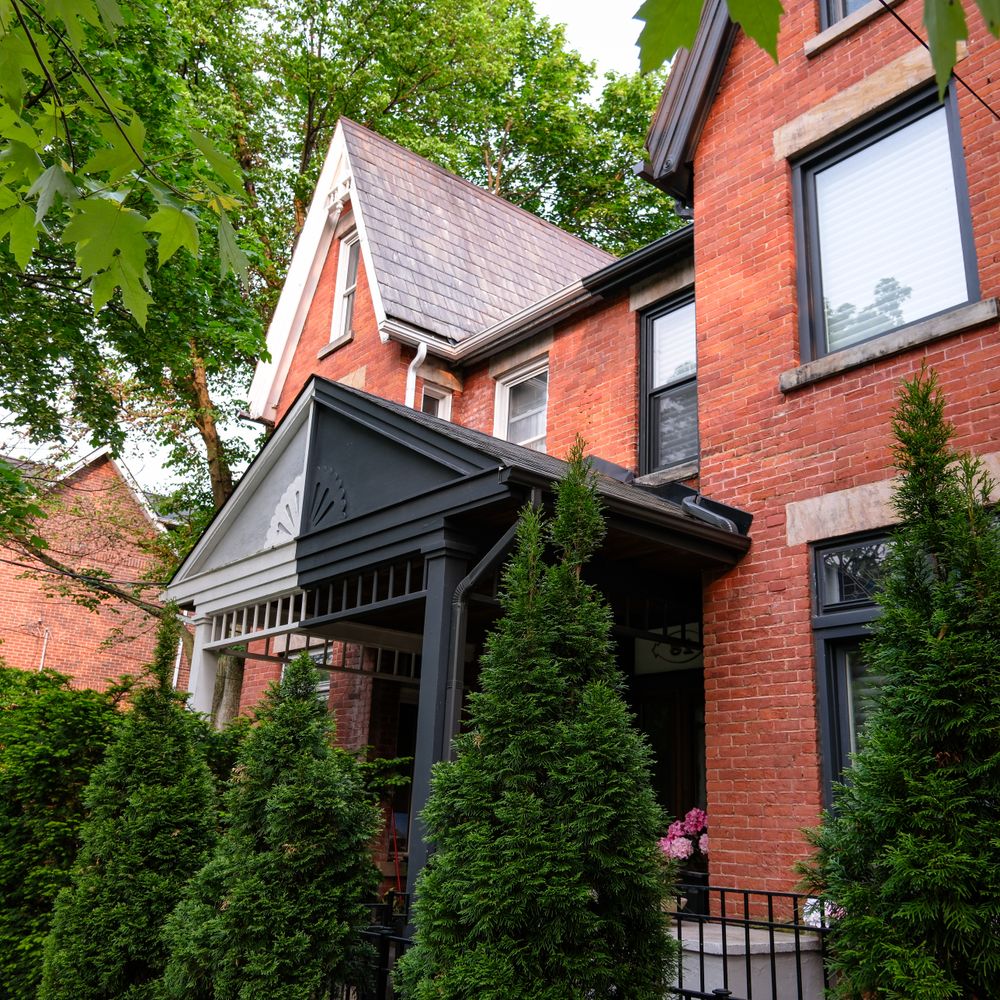 Exterior Painting in Elmstead — careful masking before painting begins
