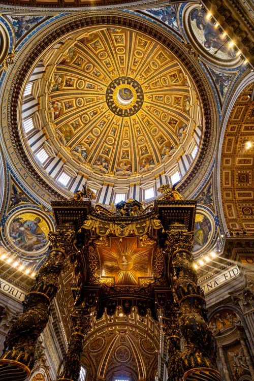 Free Captivating view of the grand interior dome of St. Peter's Basilica in Vatican City. Stock Photo