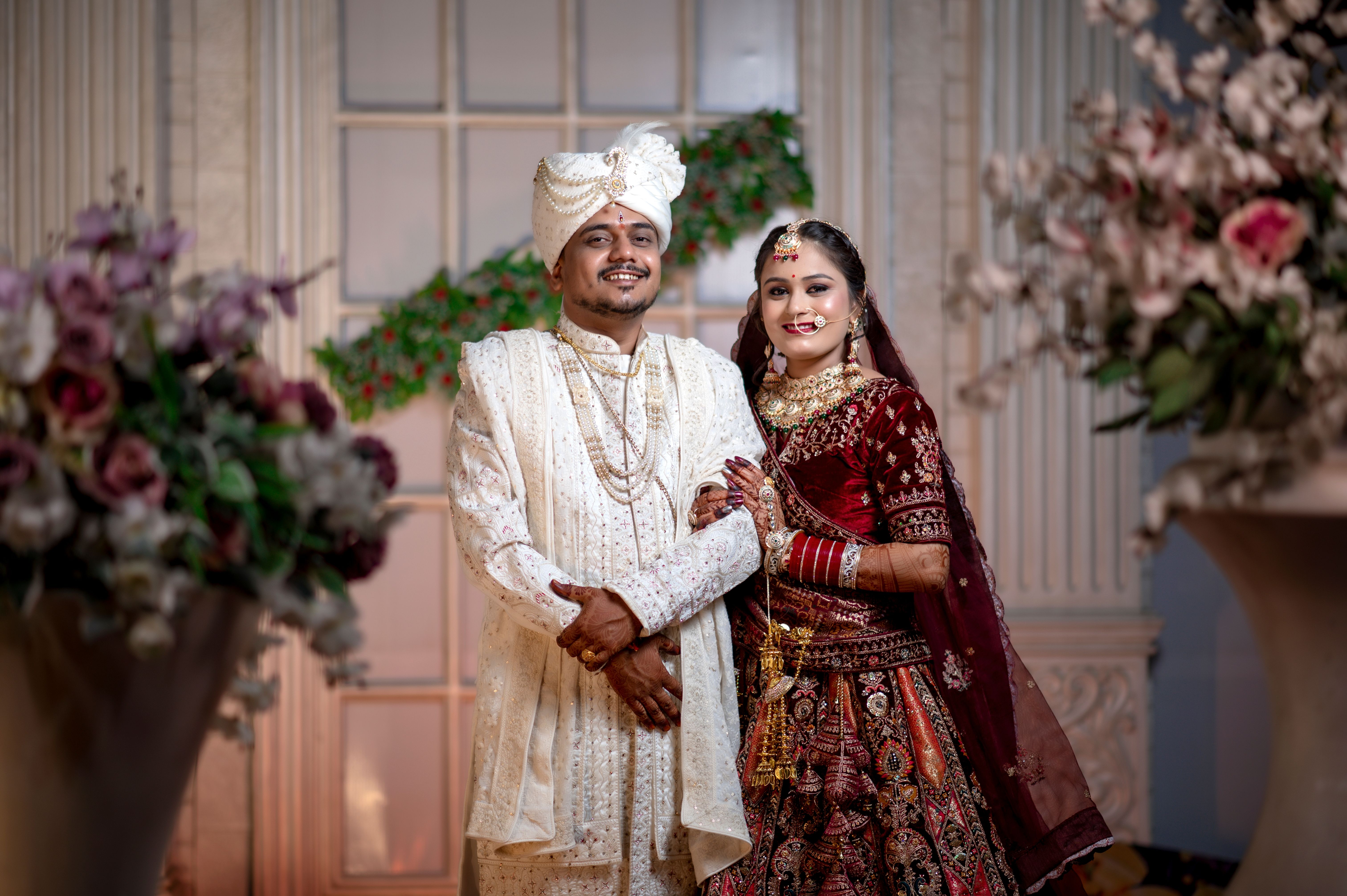 Elegant Indian Wedding Couple in Traditional Attire · Free Stock Photo