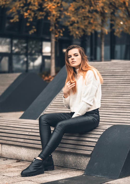 Free Photo Of Woman Sitting On Wooden Bench Stock Photo