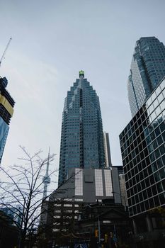 A view of Toronto's financial district with iconic skyscrapers including the CN Tower.