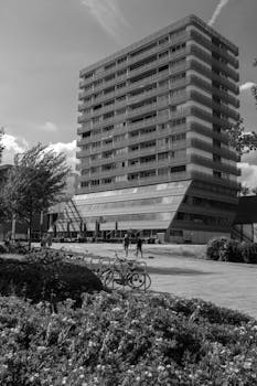 Explore urban architecture and leisure activities in Almere, captured in monochrome.