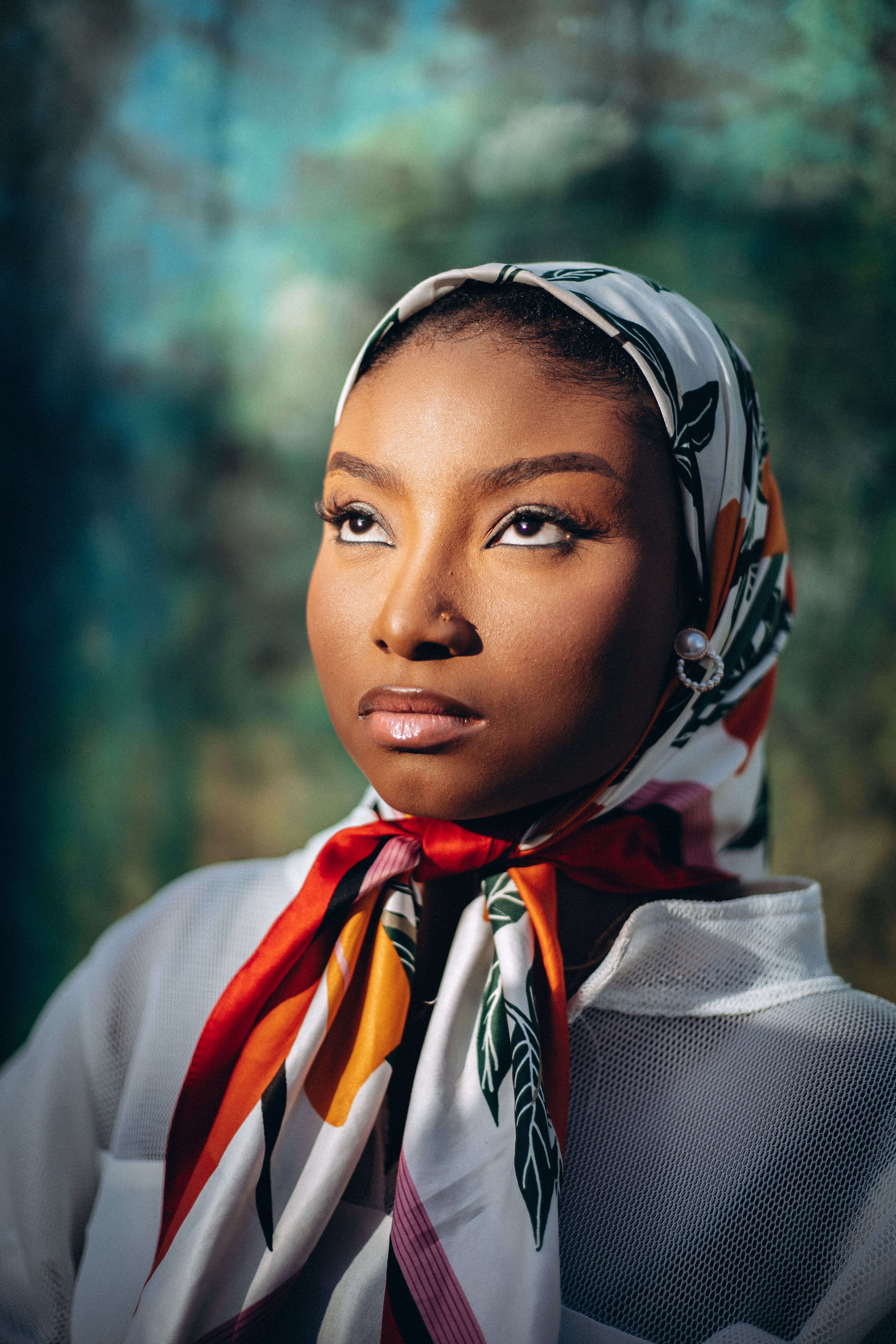 Elegant Portrait of Woman in Colorful Headscarf · Free Stock Photo