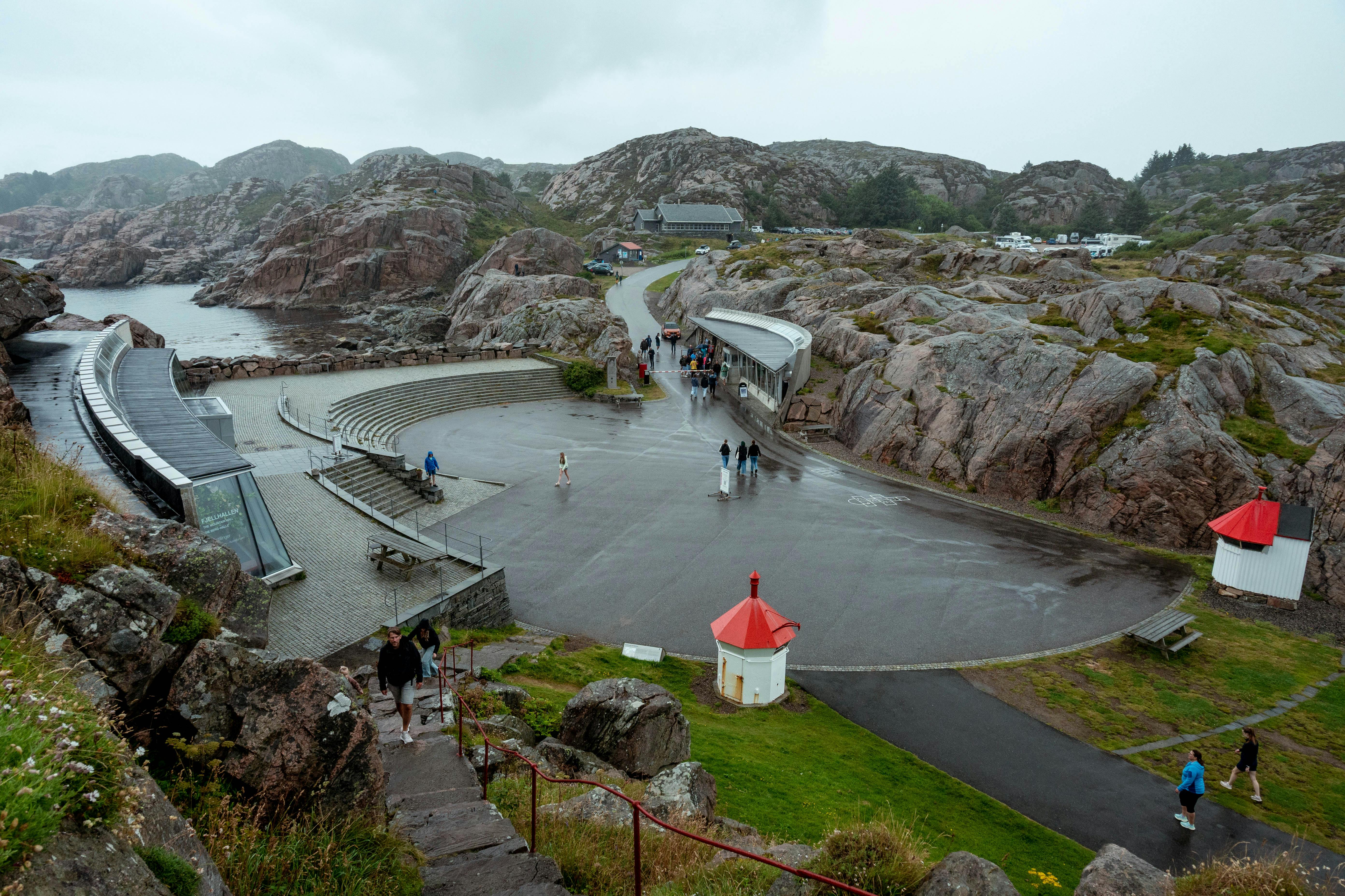 Explore the rugged beauty of Lindesnes coastline with its iconic lighthouse and natural rock formations.